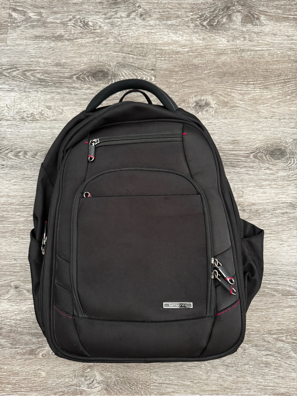 Samsonite Black Backpack with Red Accent Zippers